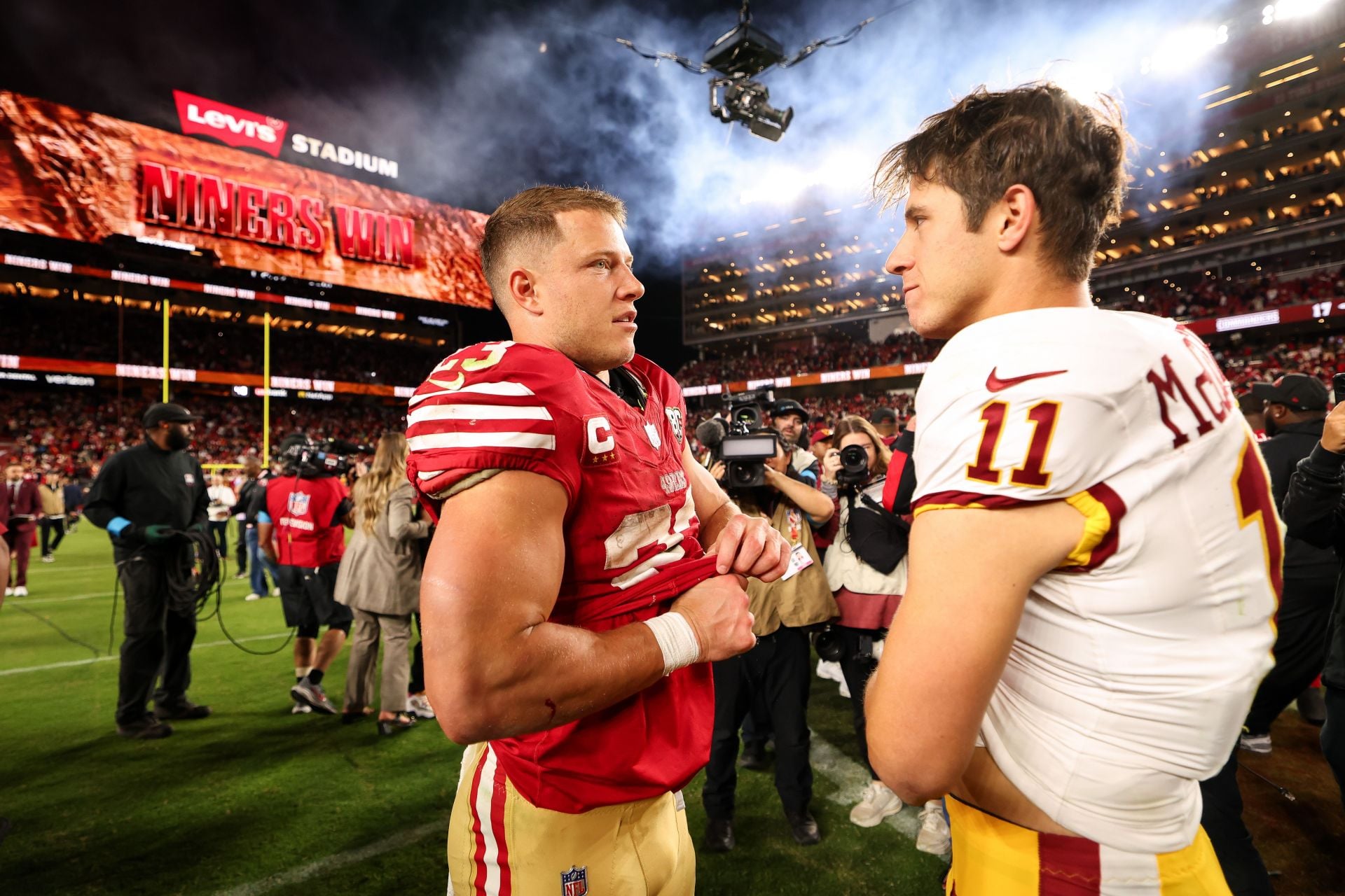 "It's why the league stays boring and soft": NFL fans react to brothers Luke and Christian McCaffrey swapping jerseys after Commanders vs 49ers