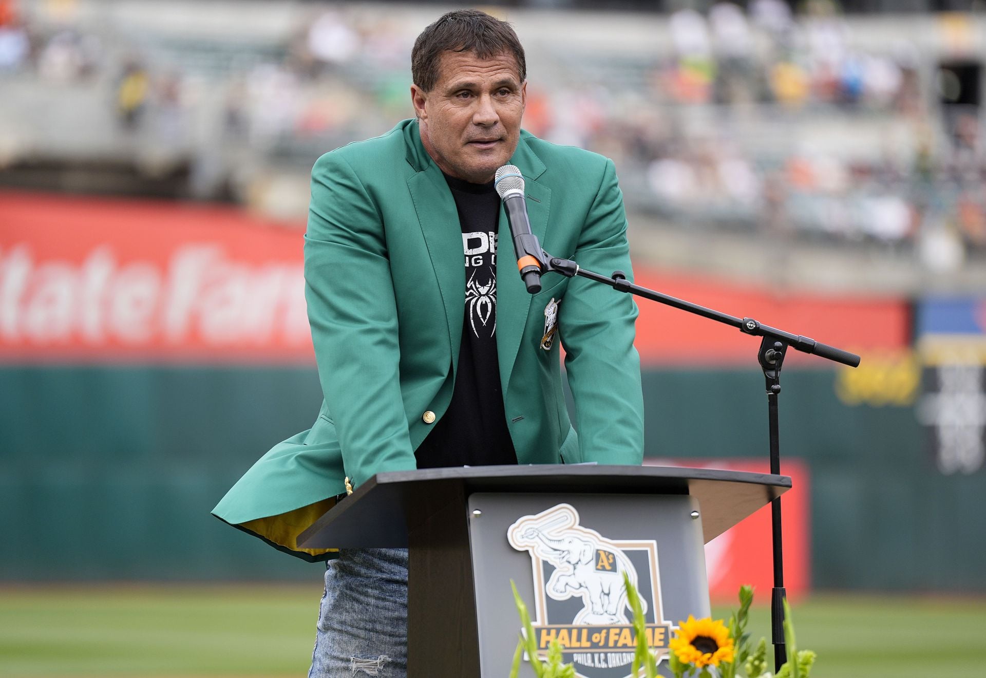 PICTURE: Jose Canseco's daughter Josie dons multi-colored bikini, soaks up the sun with furry companions