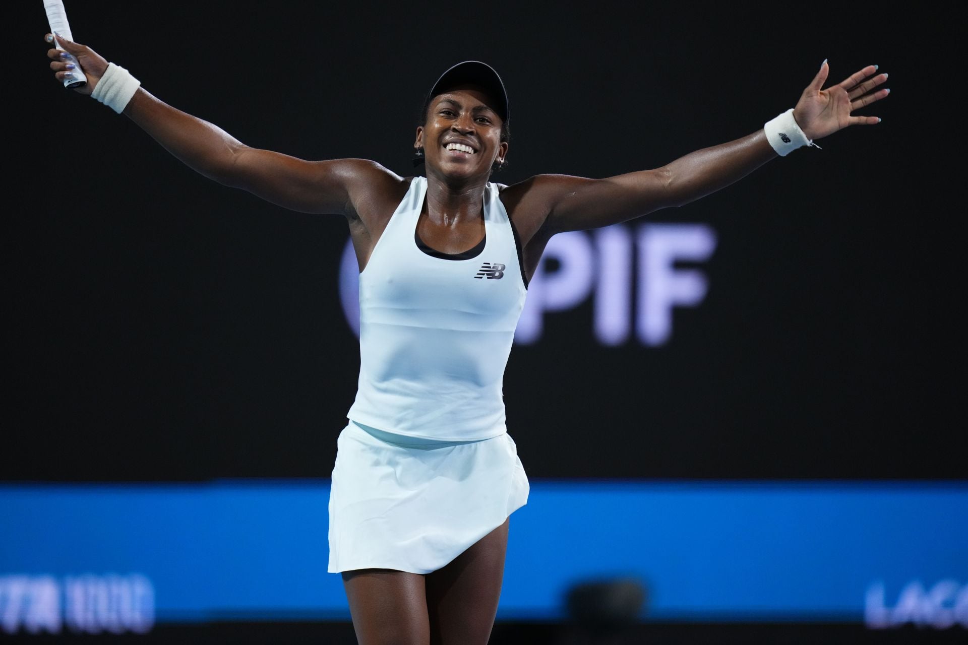 PICTURE: Coco Gauff poses in black swimwear top as she relaxes on a poolside vacation after Wuhan withdrawal