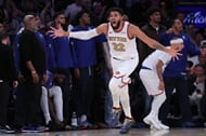Karl-Anthony Towns went into foul trouble early in the Knicks' first game of the season. - Source: Imagn