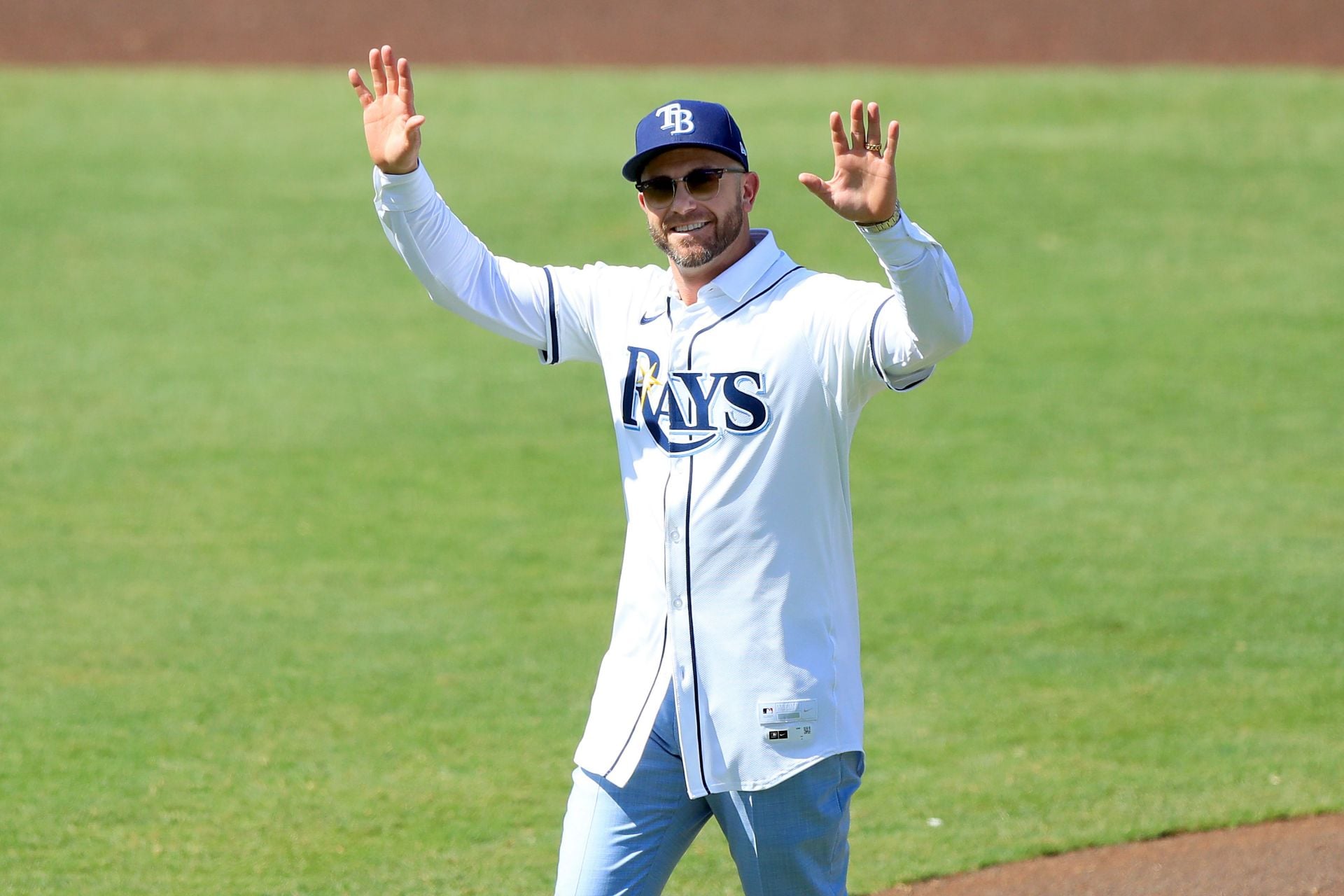 PICTURE: Evan Longoria's wife Jaime steals spotlight in floral print maxi dress during Rays legend's birthday date night at Barry's Downtown Prime