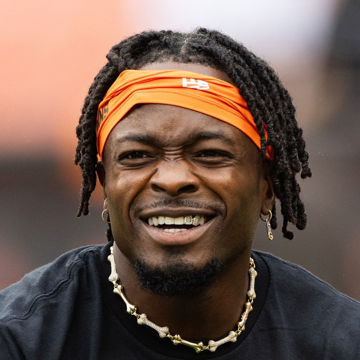 Former Cleveland Browns wide receiver Marquise Goodwin laughs during warm ups before a game - Source: Imagn