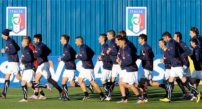 Italy begin their title defence 