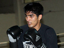 Vijender singh assured of a medal