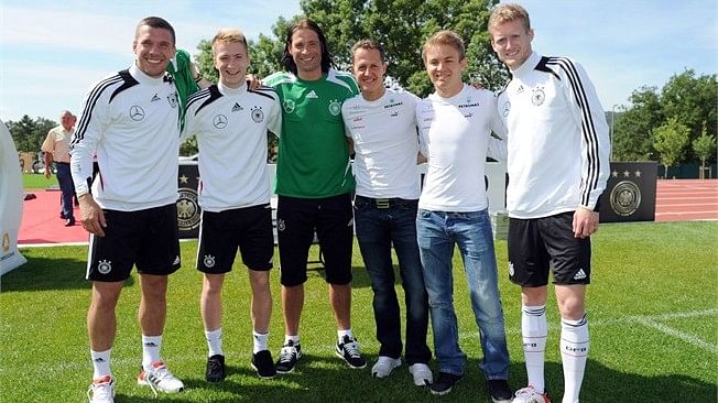 Mercedes GP's Schumacher and Rosberg meet the German Football team ahead of Euro 2012