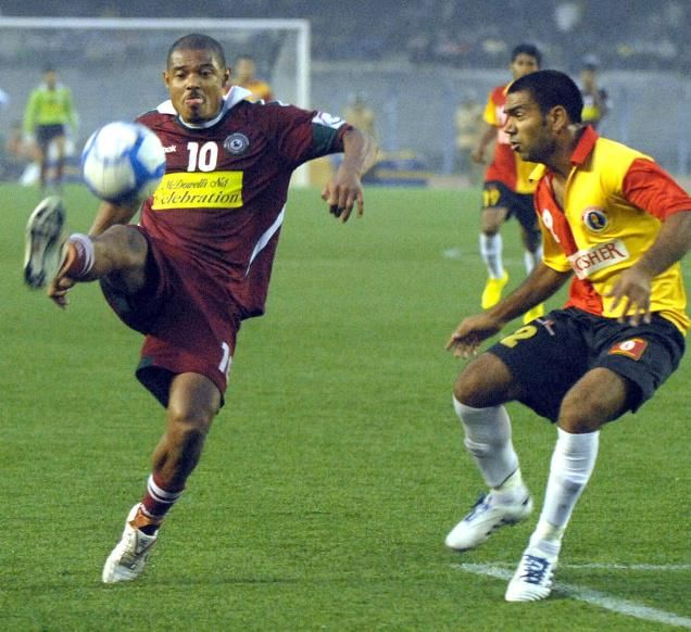 A green and maroon legend Jose Ramirez Barreto