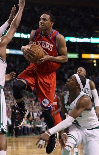 Evan Turner (L) scored the go-ahead layup and drained a couple of key free throws down the stretch