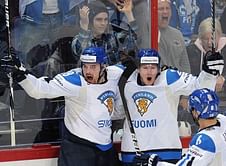 Finns, Russia go through, Slovaks upset Canada