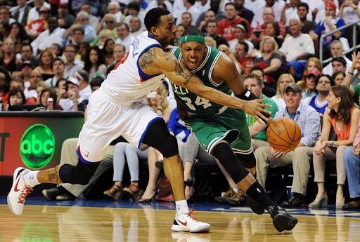 Philadelphia 76ers&#039; Andre Iguodala (L) finished with 16 points, seven rebounds and four assists