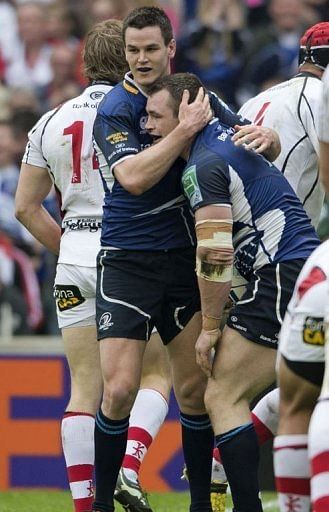 Leinster&#039;s Jonny Sexton (L) congratulates teammate Cian Healy after Healy scored a try against Ulster