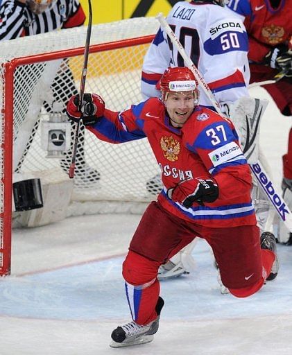 Russia&#039;s Alexander Perezhogin celebrates after scoring