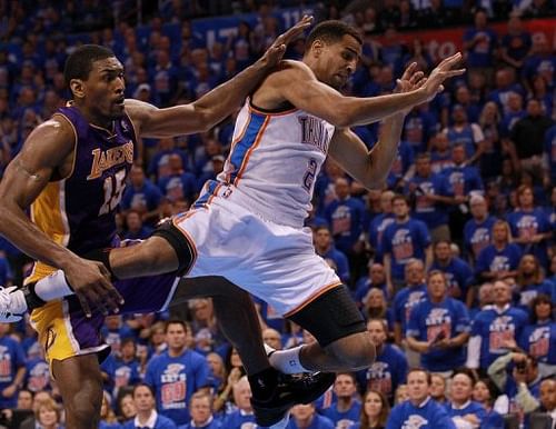 Los Angeles Lakers' Metta World Peace fouls Oklahoma City Thunder's Thabo Sefolosha