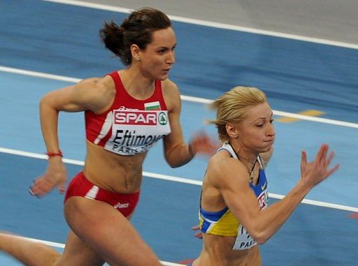 Ukraine&#039;s Mariya Ryemyen competes near Bulgaria&#039;s Inna Eftimova (left)