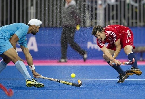 India's penalty corner specialist Sandeep Singh (L) said he hoped the pitch would not be slippery on Wednesday