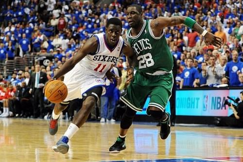 Philadelphia 76ers' Jrue Holiday (L) finished with a team-high 20 points and six assists