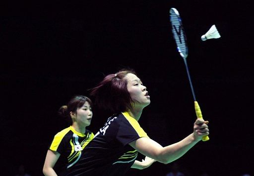 Kim Min-Jung (left) and Ha Jung-Eun of South Korea compete against Mizuki Fujii and Reika Kakiiwa of Japan