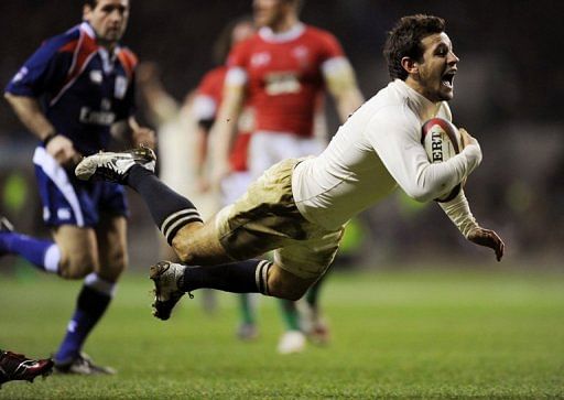 Danny Care (right) dives over to score a try against Wales during the RBS Six Nations International rugby union match