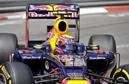 Red Bull Racing&#039;s Mark Webber has claimed pole for Sunday&#039;s Monaco GP