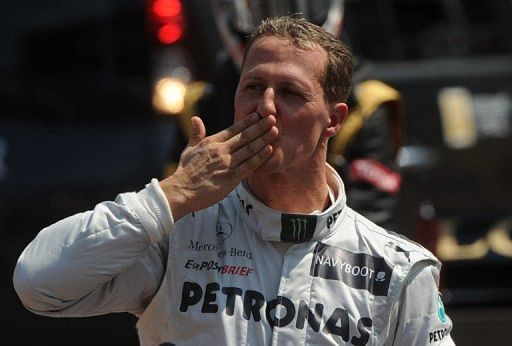 Michael Schumacher blew kisses to the fans after posting a lap time of 1min 14.301secs