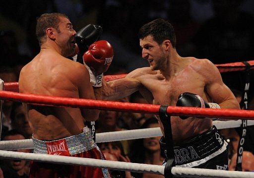 Carl Froch (right) charged his opponent from the opening bell and was the aggressor throughout the fight