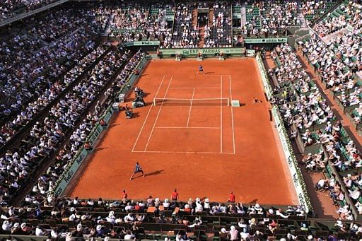French Jo-Wilfried Tsonga (down) hits a return to Russia&#039;s Andrey Kuznetsov