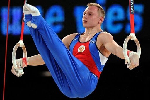 Russian Aleksandr Balandin competes on the rings