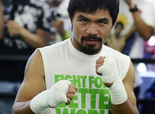 Manny Pacquiao edged Juan Manuel Marquez by majority decision on November 12, stretching his victory streak to 15 fights