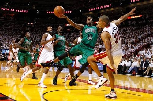 Boston Celtics' Rajon Rondo (2nd R) scored 44 points with 10 assists and eight rebounds