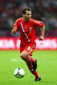 Russian team criticised for not singing anthem at Euro 2012