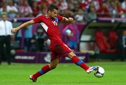 Czech striker Baros retires from international football