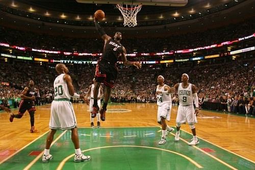 Miami Heat's LeBron James (3rd R) scored a game-high 29 points