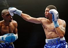 Former boxing champ Wright retires after third loss