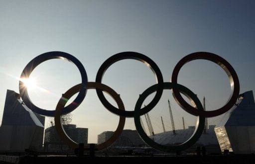 Giant Olympic Rings on a barge float on the river Thames in London in February