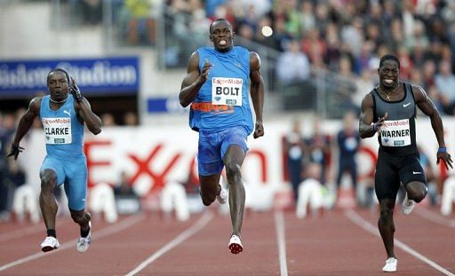 Usain Bolt, centre, is 1.96m (6&#039;5