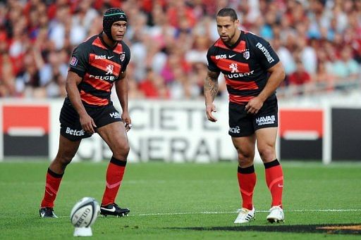 Toulouse captain Thierry Dusautoir (L) will be ably assisted by inside centre Luke McAlister