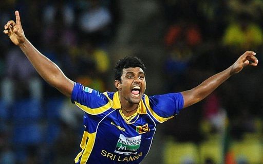 Sri Lankan cricketer Thisara Perera celebrates after his dismissal of Pakistan cricket captain Misbah-ul-Haq