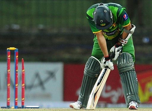 Pakistan cricketer Azhar Ali reacts after being dismissed by Sri Lankan cricketer Nuwan Kulasekara