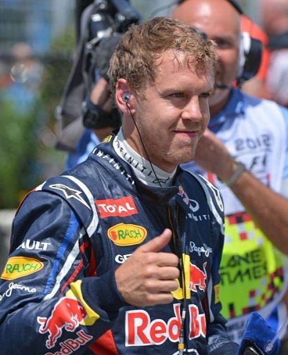 Pole position winner Red Bull Racing driver Sebastian Vettel