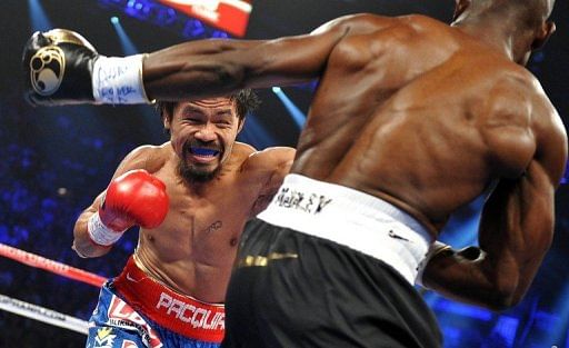 Manny Pacquiao (left) goes on the attack against Timothy Bradley during their fight in Las Vegas on Saturday night