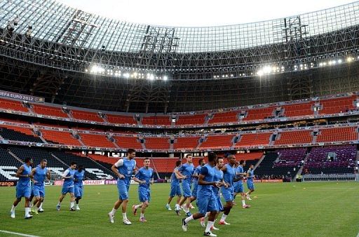 France&#039;s national football team players warm up during a training session at the training center in Kircha
