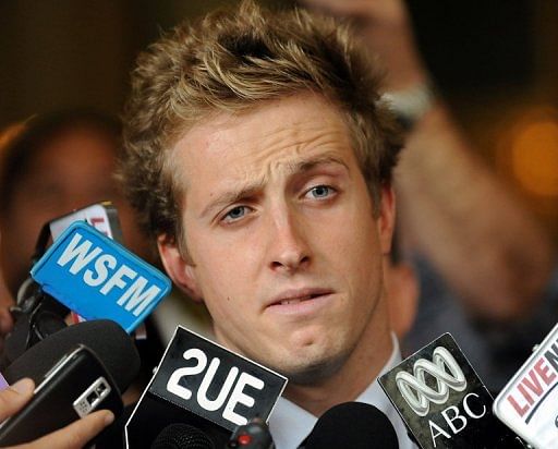 Nick D&#039;Arcy leaves court in 2009 after being given a suspended jail sentence for assaulting another swimmer