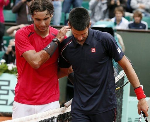 Nadal consoles Djokovic after the match