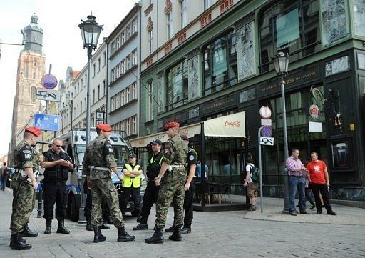 Polish policemen and military police forces outside the fan zone in Wroclaw on June 8