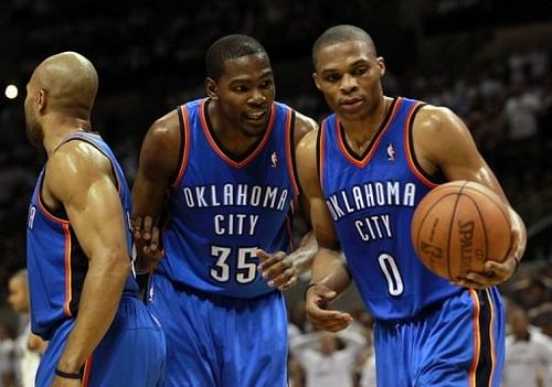 Oklahoma City Thunder's Kevin Durant (C) and Russell Westbrook (R) during their NBA Western Conference Finals