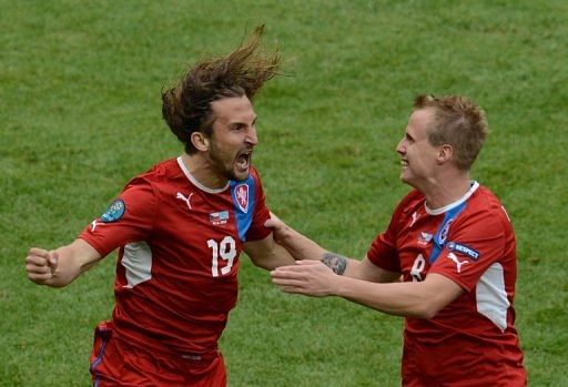 Czech Republic kept their Euro 2012 hopes alive with a 2-1 win over Greece