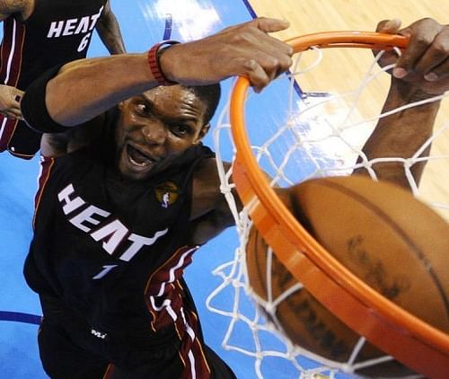 Miami Heat's Chris Bosh makes a basket