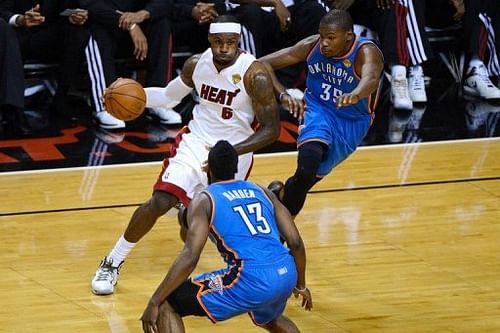 Miami Heat's eBron James (L) made 11-of-23 shots from the field and was a force on both defense and offense