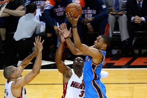 Oklahoma City Thunder guard Russell Westbrook (R) finished with a game-high 43 points