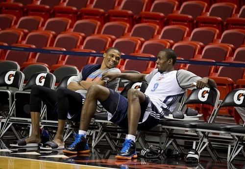 Oklahoma City Thunder players Russell Westbrook (L) and Serge Ibaka attend practice