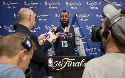 Oklahoma City Thunder player James Harden talks to reporters before practice at the American Airlines Arena in Miami
